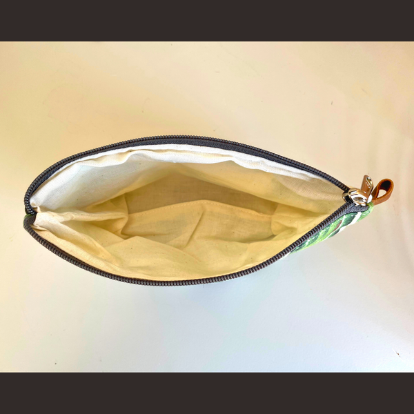 The inside of the cosmetic bag is white linen and super soft